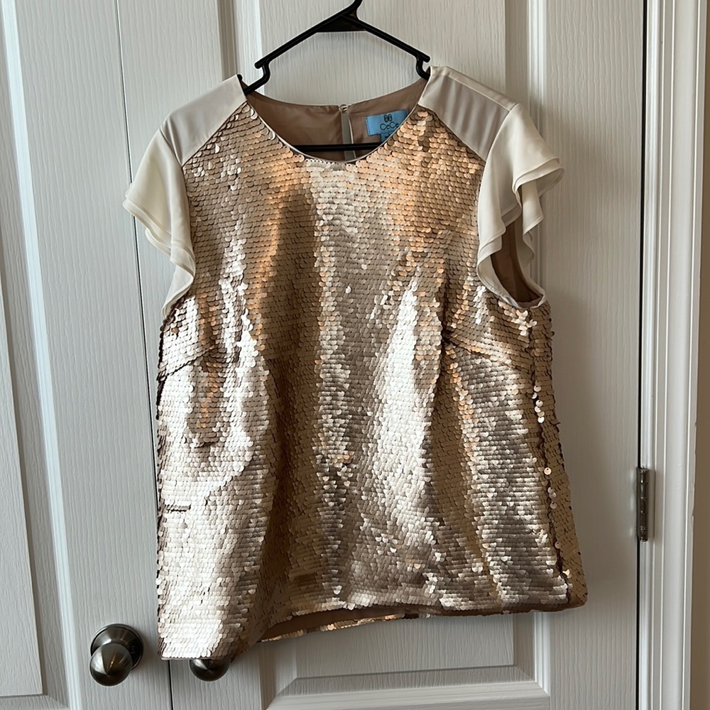 Gold sequined top with flutter cap sleeves